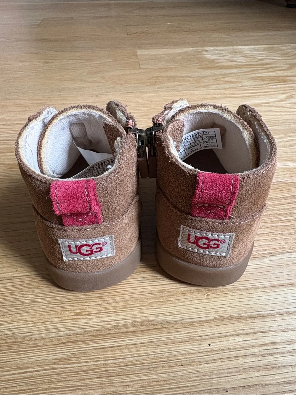 UGG Kids | Brown Suede Zip Ankle Boots with Red Trim